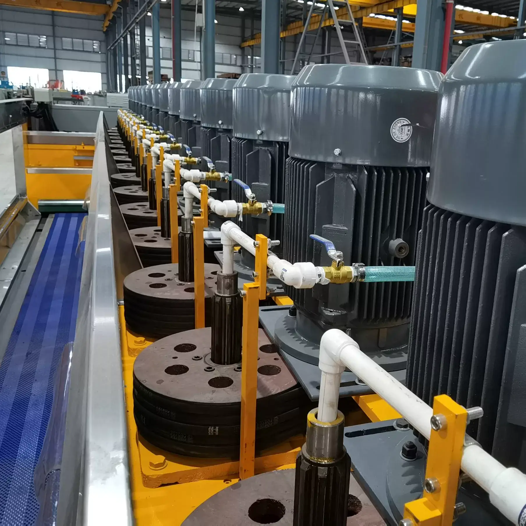 Row of independent heavy-duty motors for each polishing head