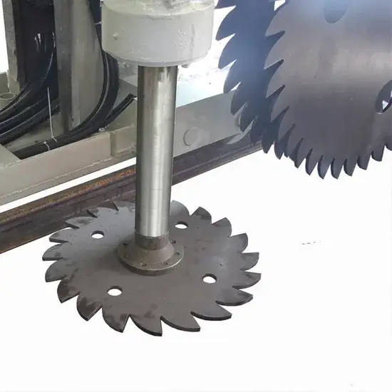 Close up showing vertical blades cutting downward while a horizontal blade undercuts the base