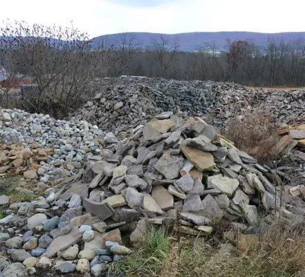 Sorting quarry waste rubble to maximize L-corner stone yield on a veneer saw